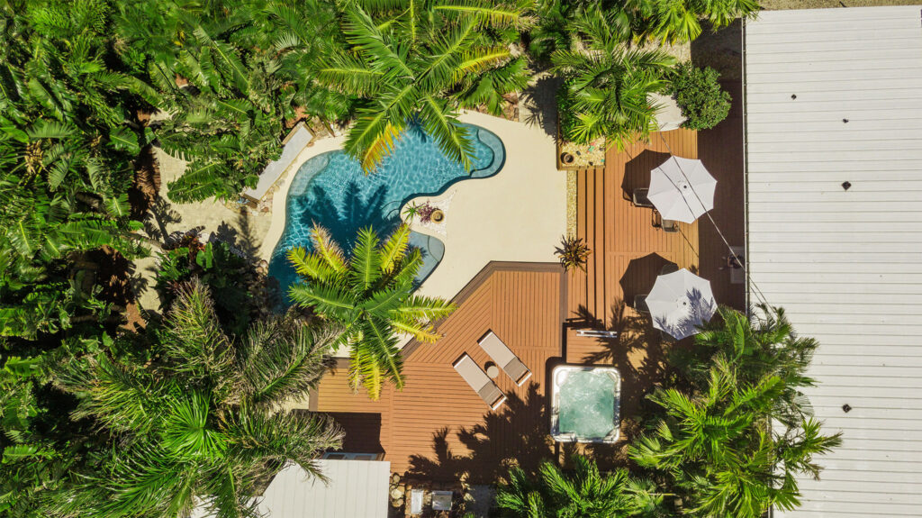 Exclusive Tropical Paradise with tropical saltwater pool, spa, and shaded seating